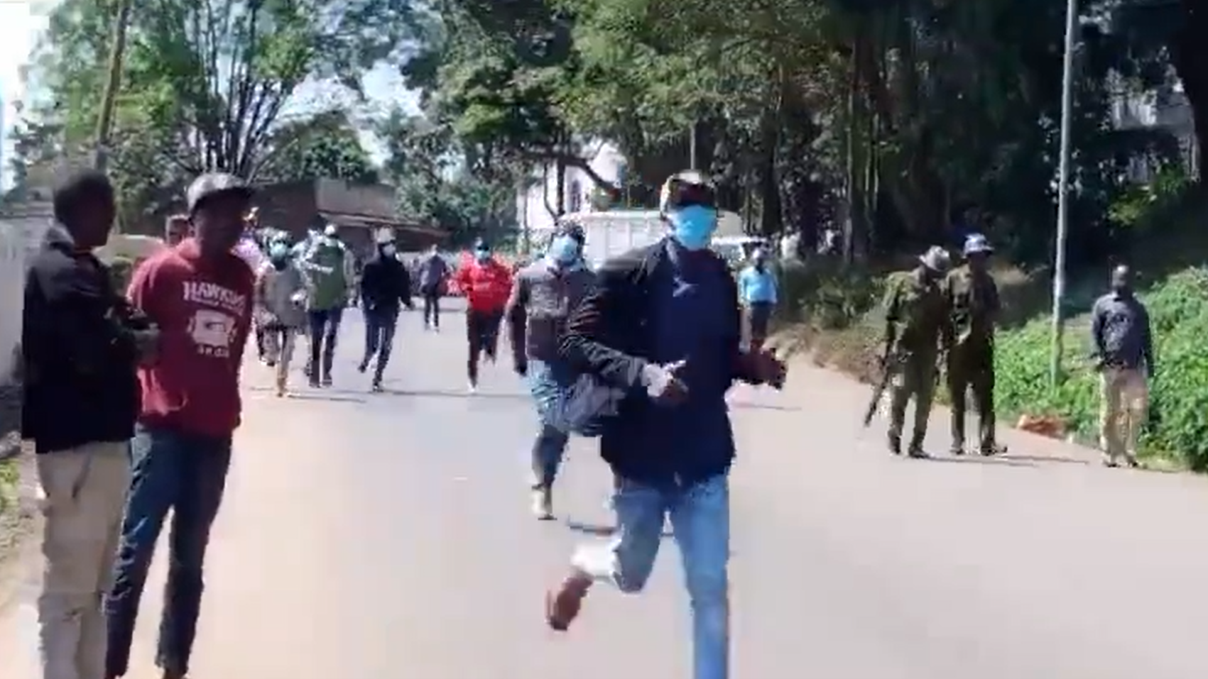 A screen grab image of protests outside Kawira Mwangaza's office.